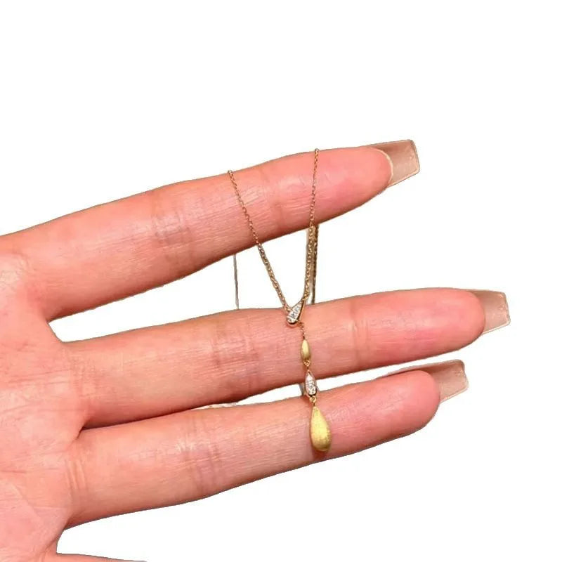 2025 New Style Zirconium Teardrop Brushed Necklace Medieval Tassel Gold Melon Seed Clavicle Necklace for Women