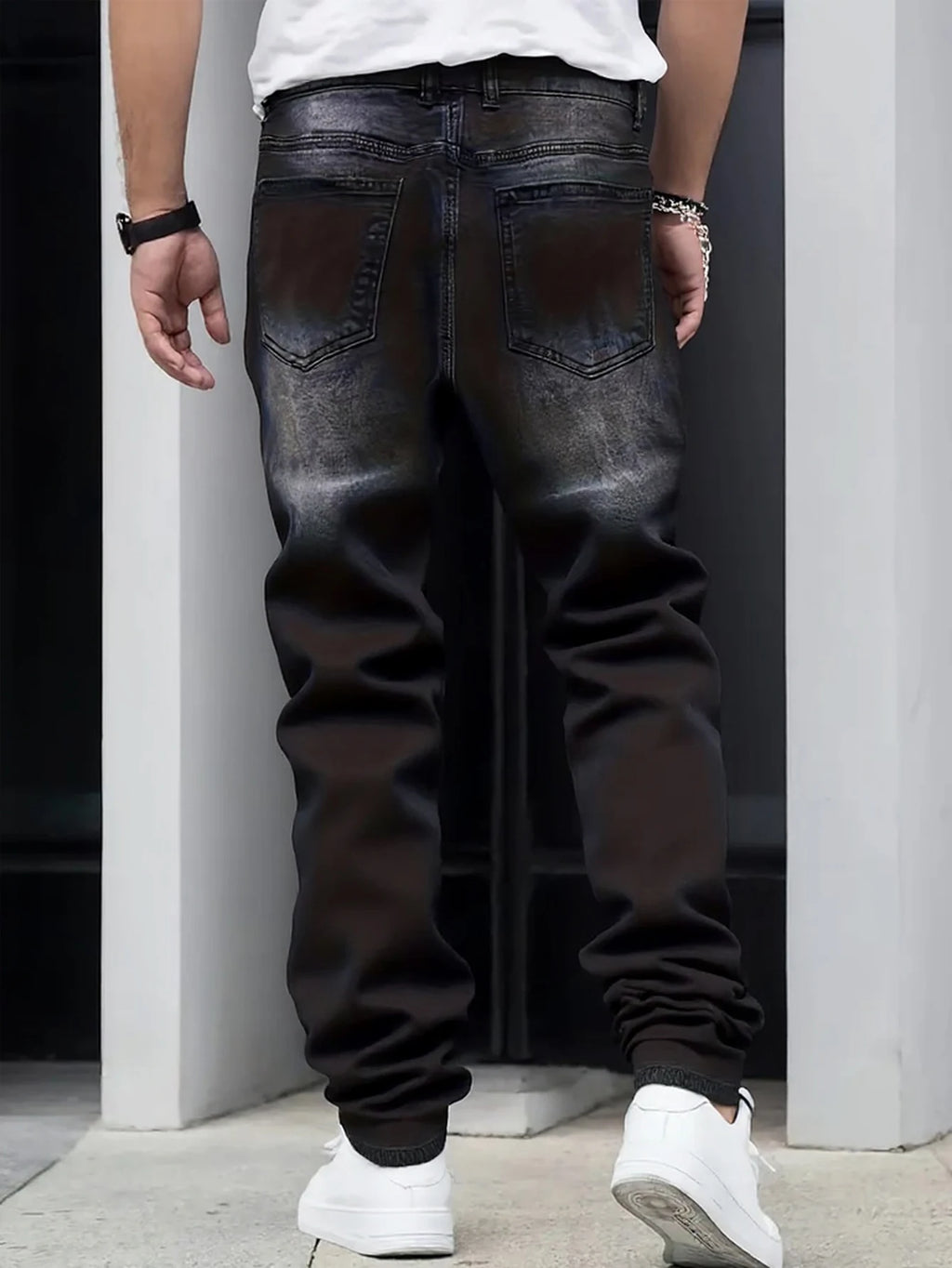 Men's black and gray distressed jeans, featuring a unique worn-out design, loose fit, and versatile style, effortlessly creating