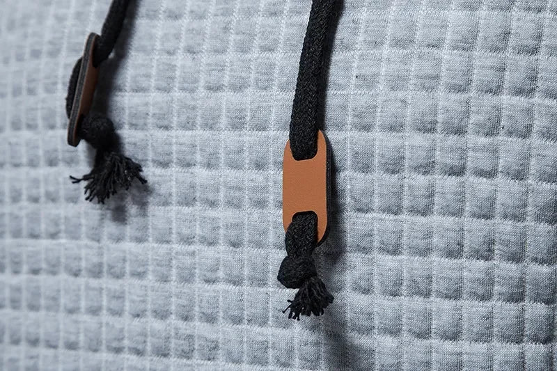 Autumn and winter, casual sportswear, men's checkered design pockets and shoelaces, waffle embossed hooded sweater