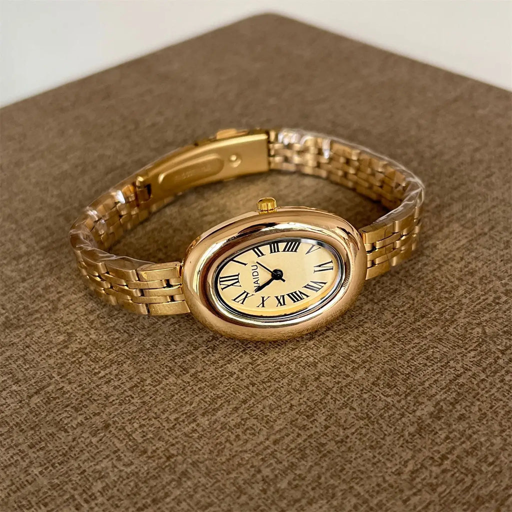 Hot Sale Fashion Watch for Women Mid Ancient Style Oval Dial Small Gold Watch Adjustable Steel Strap Quartz Wristwatch Wholesale