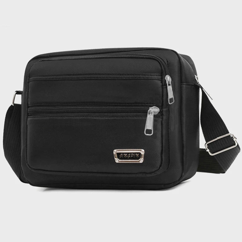 Men's business bag with double pockets, can be worn crossbody or over the shoulder, suitable for business trips.